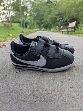 Nike Kids Black Sneakers with White Swoosh and Velcro Straps